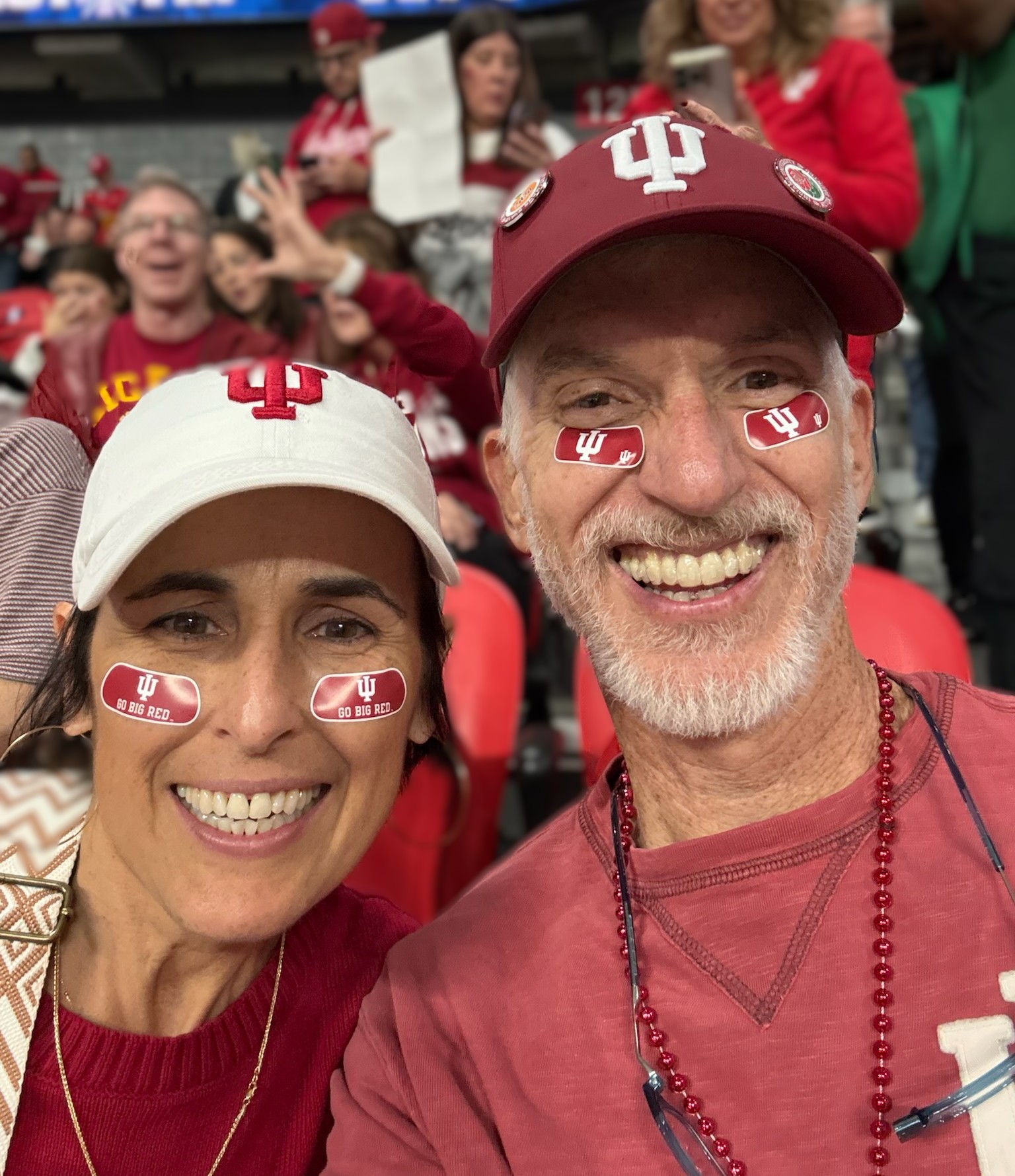 dr. burns and wife at football game