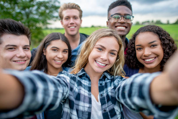 many teenagers taking a selfie